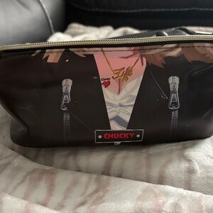 Women’s Cosmetic Case with Bold Red Interior and Chain Handle